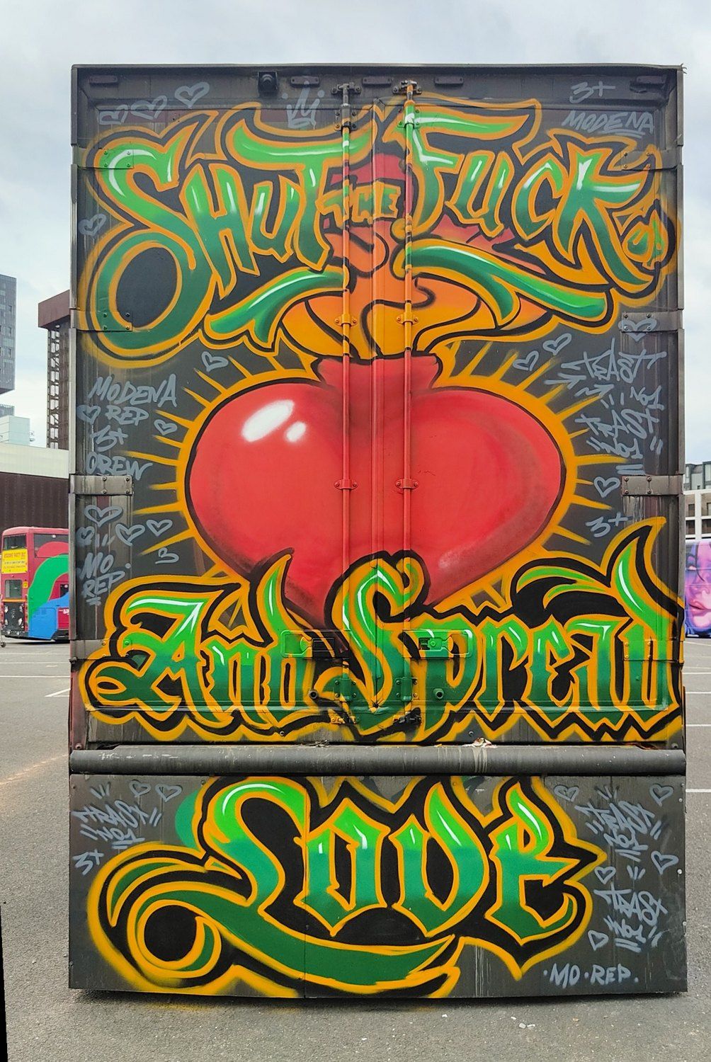 Back of a truck painted with a sacred heart