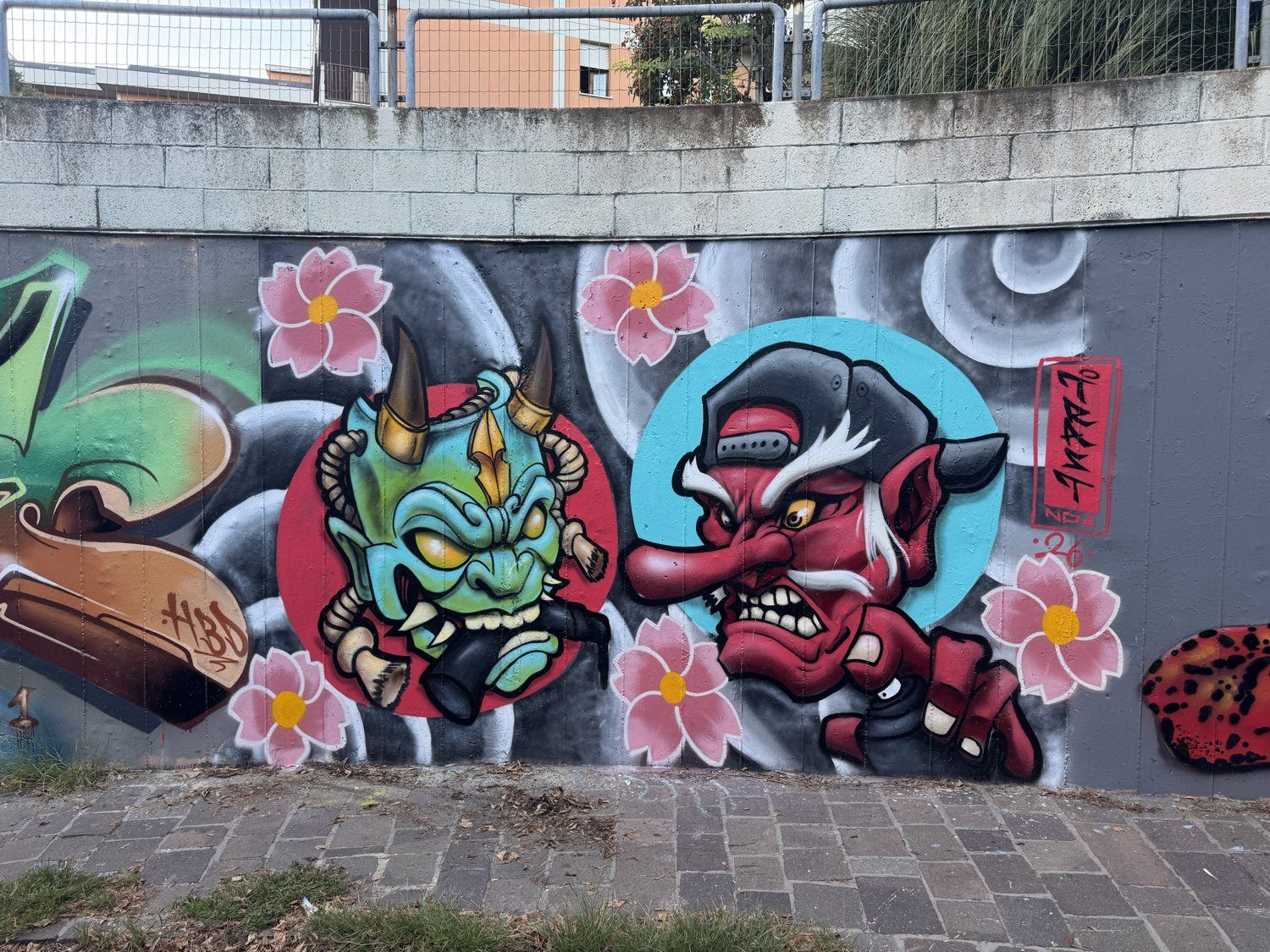 Hannya and Tengu masks with cherry blossoms