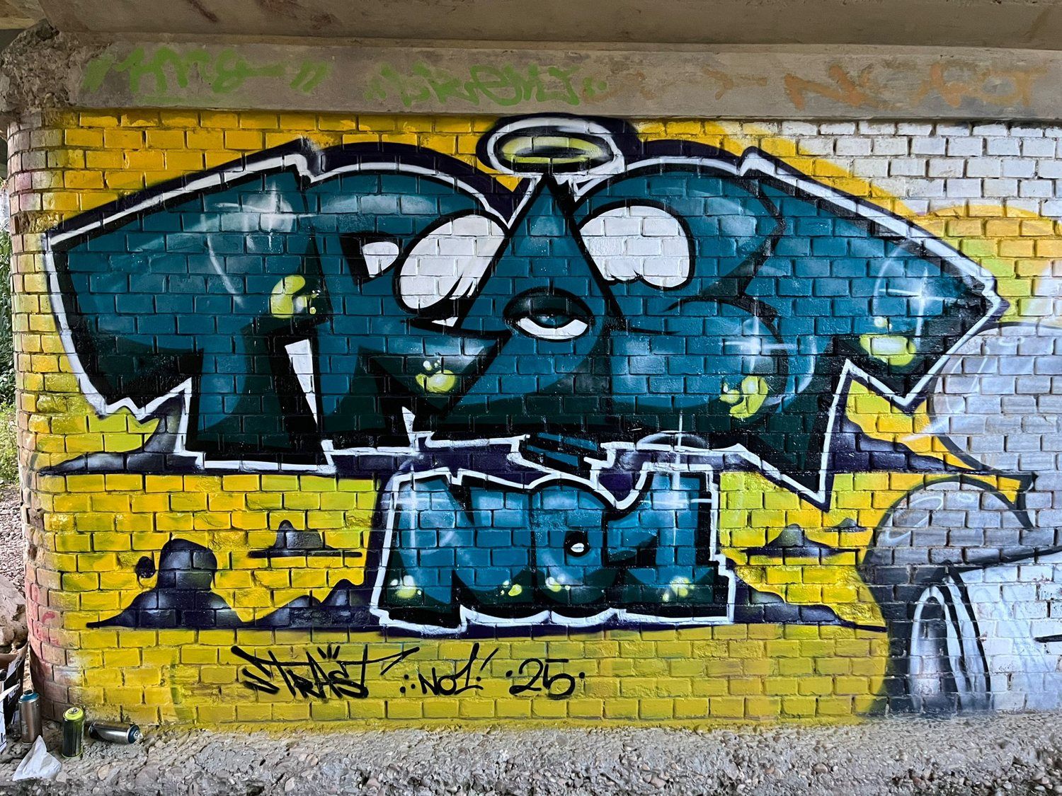 TrAsT No1 lettering on yellow bricks